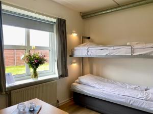 Postel nebo postele na pokoji v ubytování Danhostel Skagen