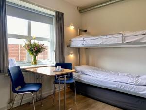 Postel nebo postele na pokoji v ubytování Danhostel Skagen