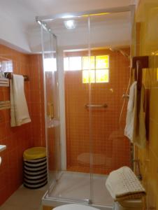 a bathroom with a shower and a toilet at Manta Rota Beach, apartment in a villa, terrace,garden in Manta Rota