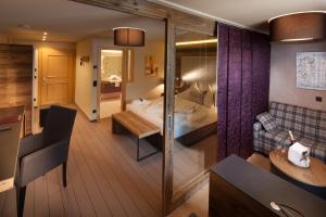 Postel nebo postele na pokoji v ubytování Boutique Hotel die Mittagspitze Superior