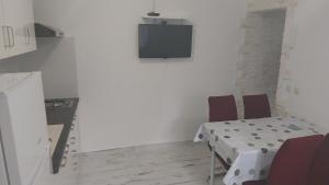TV a/nebo společenská místnost v ubytování JAN 2
