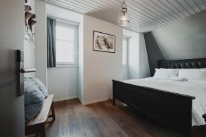 Letto o letti in una camera di No8 Boutique Hotel - self check in