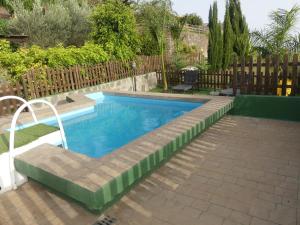 The swimming pool at or close to Holiday Home El Brezal