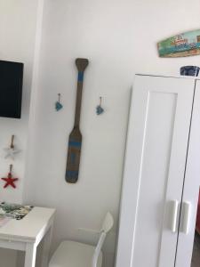 Televízia a/alebo spoločenská miestnosť v ubytovaní Case vacanze I trabocchi