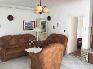 Posezení v ubytování Sirály Apartman