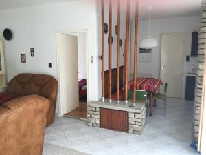 Posezení v ubytování Sirály Apartman
