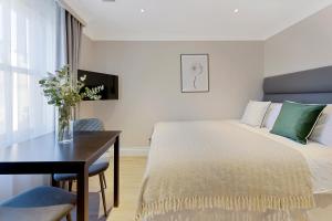 Cleveland Residences Paddington客房内的一张或多张床位