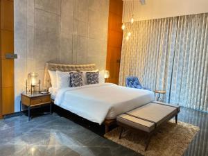 Cama ou camas em um quarto em Gamyam Beach Resort