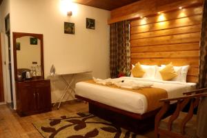 Voodi või voodid majutusasutuse Spring Muunnar, Munnar toas