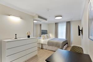 Cleveland Residences Paddington客房内的一张或多张床位