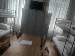 A bed or beds in a room at CH-Hostel