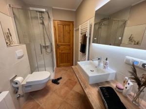Koupelna v ubytování Ferienwohnung Baumann + 17 fotografií