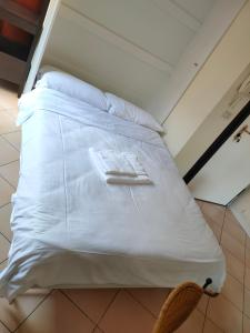Postel nebo postele na pokoji v ubytování Terrazza Paradisus