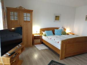 En eller flere senge i et værelse på Ferienwohnungen Christa Grabmeier