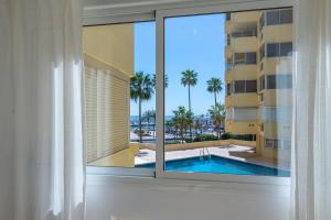 Bazén v ubytování Appartement en front de mer nebo v jeho okolí