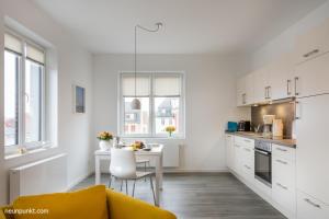 Η κουζίνα ή μικρή κουζίνα στο Heimathafen 4 - M S Poseidon