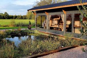 Zahrada ubytování The Barn - Aurora Hoeve - loft met jacuzzi