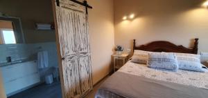 Łóżko lub łóżka w pokoju w obiekcie Apartamentos Nordeste