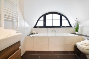 Koupelna v ubytování Zweite Heimat + 16 fotografií