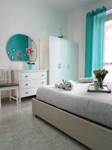 Postel nebo postele na pokoji v ubytování Tiffany Home Juventus Stadium - Accogliente e moderno