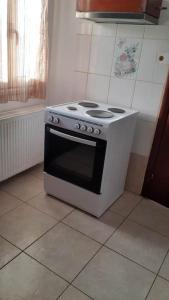 A kitchen or kitchenette at Eirinis home