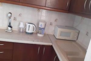 A kitchen or kitchenette at Eirinis home