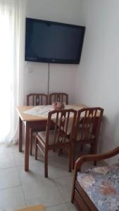 A television and/or entertainment centre at Eirinis home