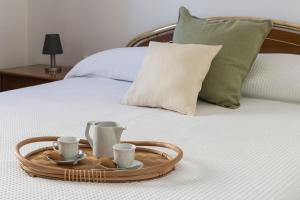 A bed or beds in a room at Casa Marianna by Garda FeWo