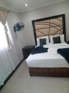 Cama o camas de una habitación en Essential Guest House Parow