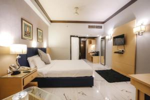 TV o dispositivi per l'intrattenimento presso Hotel Pal Heights