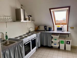 Kuchyň nebo kuchyňský kout v ubytování Danhostel Skagen