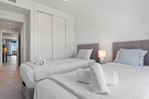 Posteľ alebo postele v izbe v ubytovaní Seaview apartment with heated pool by Costarentals - Ref M21