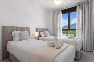 Posteľ alebo postele v izbe v ubytovaní Seaview apartment with heated pool by Costarentals - Ref M21 + 25 fotografií