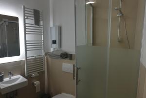 Koupelna v ubytování Studio Apartments in Ruhrgebiet + 7 fotografií