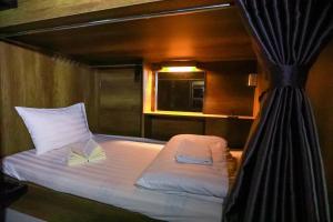 מיטה או מיטות בחדר ב-Bui Vien Street Hostel