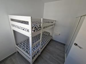 Łóżko lub łóżka w pokoju w obiekcie Apartamento mi currilla
