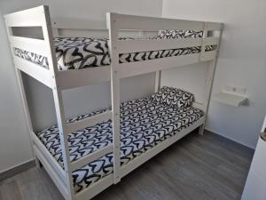 Łóżko lub łóżka w pokoju w obiekcie Apartamento mi currilla