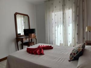 Postel nebo postele na pokoji v ubytování Hotel Al-Andalus