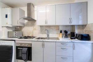 Kitchen o kitchenette sa Fabulous apartment in the heart of Shoreditch