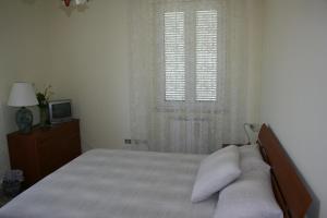 Postel nebo postele na pokoji v ubytování Bed and Breakfast Elisa
