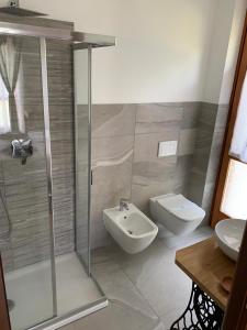 a bathroom with a shower and a sink and a toilet at "La Pepita" di Pietro Bertolotti in Spagna +11 photos