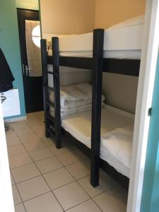 Posteľ alebo postele v izbe v ubytovaní Vue mer sur la côte d'opale, studio la naturelle pour 4 personnes , WIMEREUX
