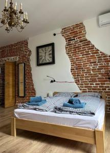 Gulta vai gultas numurā naktsmītnē Apartments Galicia
