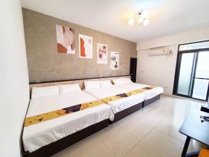 Postelja oz. postelje v sobi nastanitve New Summer Homestay