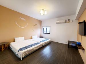 Postelja oz. postelje v sobi nastanitve New Summer Homestay