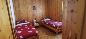 Postel nebo postele na pokoji v ubytování Appartamento con vista su pista Stelvio