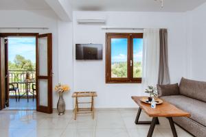 TV a/nebo společenská místnost v ubytování Deluxe Suites