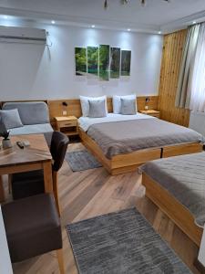 Posteľ alebo postele v izbe v ubytovaní Lake House