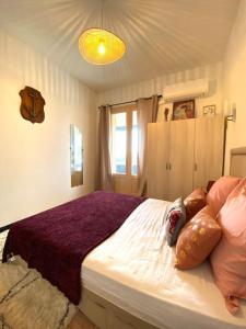 Posteľ alebo postele v izbe v ubytovaní Maison de village en granite
