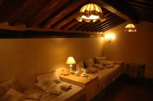Postel nebo postele na pokoji v ubytování Agriturismo Tara + 37 fotografií